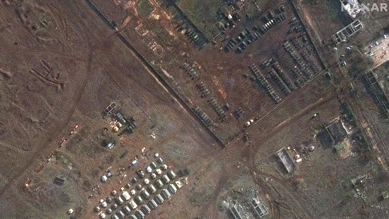 This handout image released by Maxar technologies on February 2 shows a view of troop tents and armoured vehicles at Yevpatoriya in Crimea. Picture: Handout/Satellite image Â©2022 Maxar Technologies/AFP