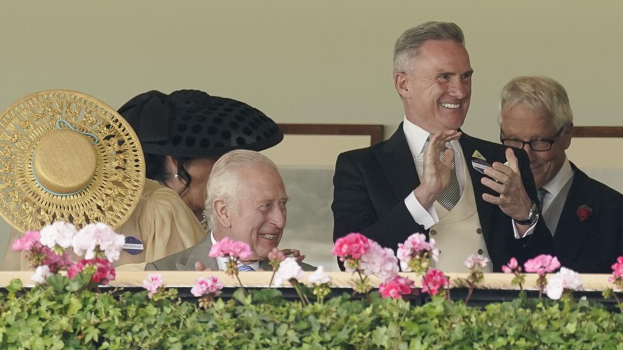 VRC chairman Neil Wilson (clapping) delights in Asfoora’s win alongside King Charles III in the Royal Box at Royal Ascot. Picture: Alan Crowhurst / Getty Images