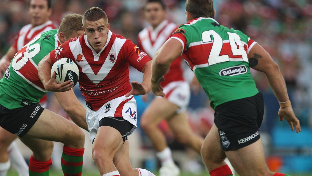 Cameron King storms through the South Sydney line during the 2011 Charity Shield.