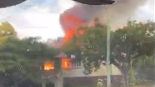 Fire engulfs a home in Hamilton on Sunday afternoon.