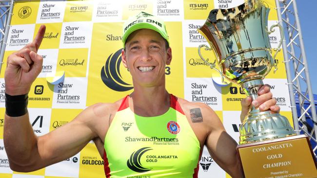 Coolangatta Gold 2023 winner Ali Day holds the trophy to claim his ninth title. Picture: Supplied