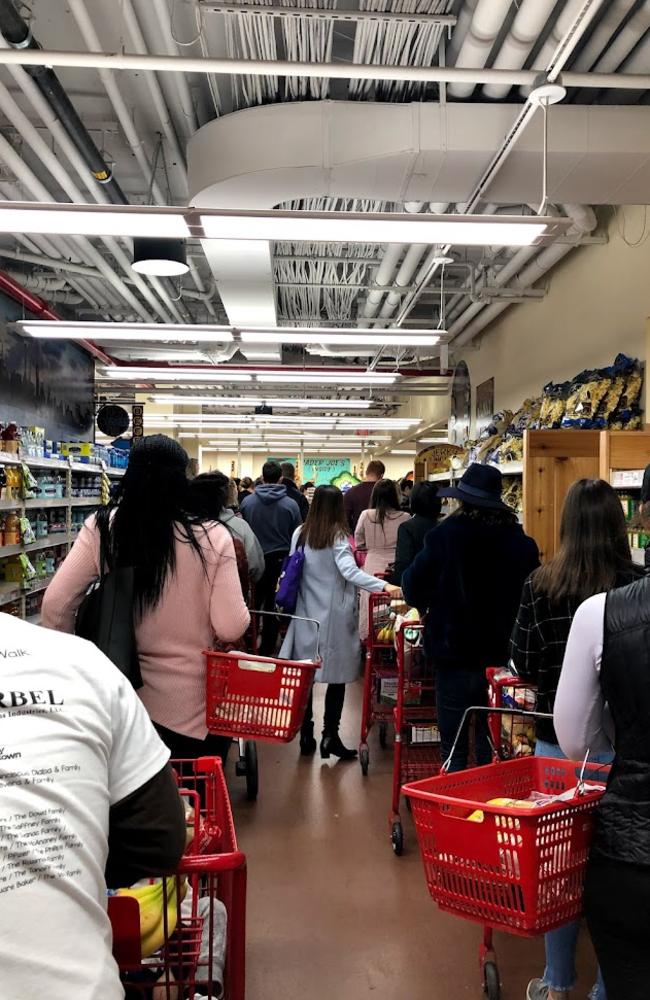 Organised chaos: Trader Joe’s supermarkets in America have no self-serve checkouts. Instead, dozens of staff are employed to keep queues flowing . Picture: Google