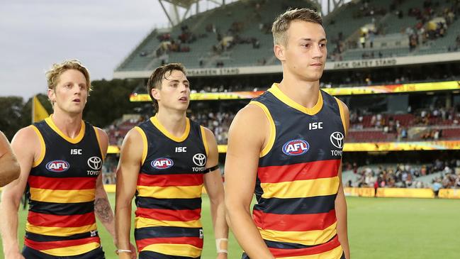 Tom Doedee walks off after suffering a year-ending ACL injury. Picture Sarah Reed