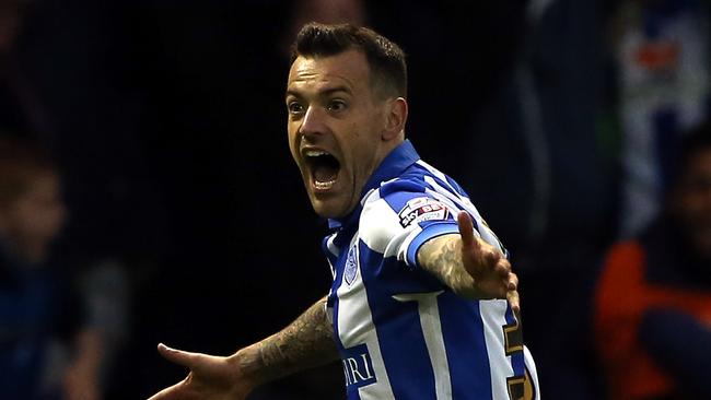 Ross Wallace of Sheffield Wednesday celebrates scoring during the Championship playoff first leg.
