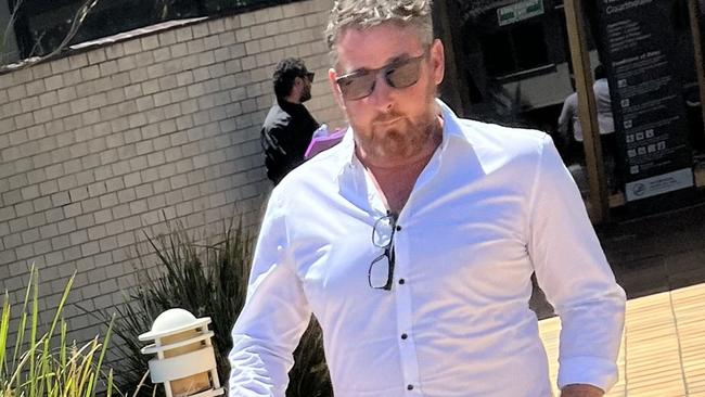 Andrew Van Hamburg leaves Tweed Heads Local Court.