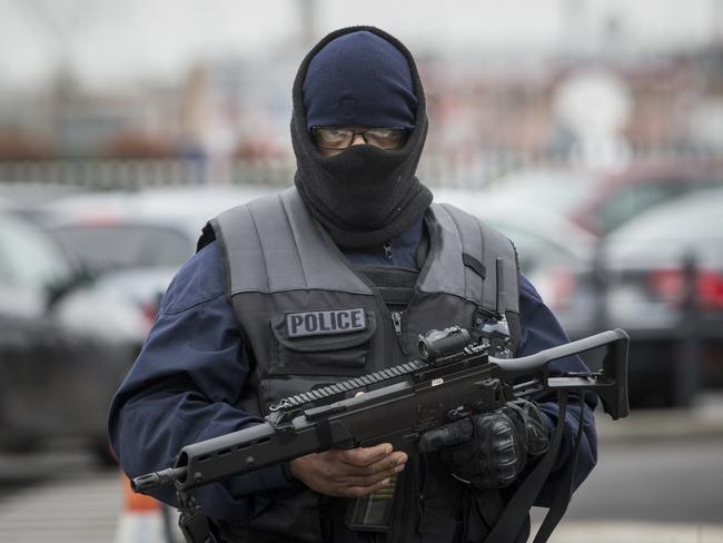 An elite police officer patrols at Orly Airport, south of Paris. Picture: AP