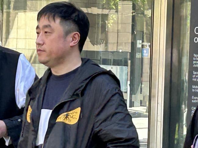 Wei Wang outside County Court after pleading guilty to his involvement in a money laundering syndicate with two others.