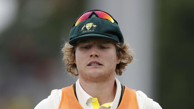 CANBERRA, AUSTRALIA - FEBRUARY 01: Will Pucovski of Australia runs drinks during day one of the Second Test match between Australia and Sri Lanka at Manuka Oval on February 01, 2019 in Canberra, Australia. (Photo by Ryan Pierse/Getty Images)