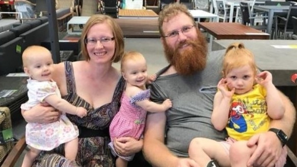 Scott Burrage with his wife Kylie and their three girls.