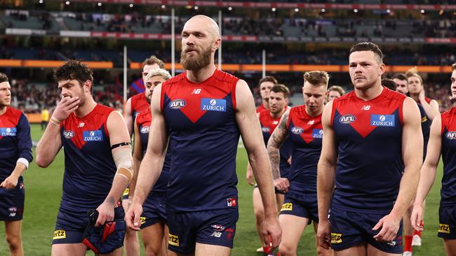 Skipper Max Gawn leads the Demons off the MCG after losing to Brisbane. Picture by Michael Klein