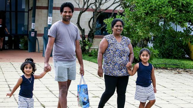 Kokilapathmapriy Nadarasa, known as Priya, with her husband Nadesalingam Murugappan, known as Nades, and their daughters Kopika and Tharunicaa leave the recreation centre on Christmas Island early this year. Picture: Colin Murty