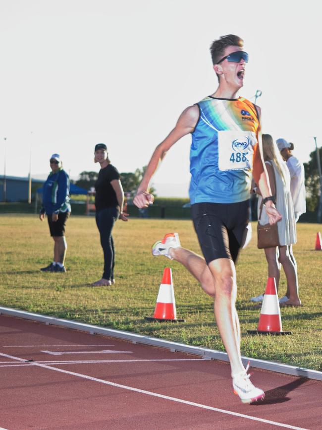 1500m winner was pretty happy! Mackay Athletics Summer Series. November 20th, 2021. Picture: Marty Strecker