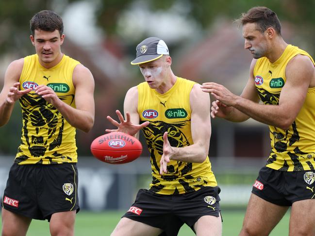 Draftees Harry Armstrong and Thomas Sims with Toby Nankervis Picture: Mark Stewart