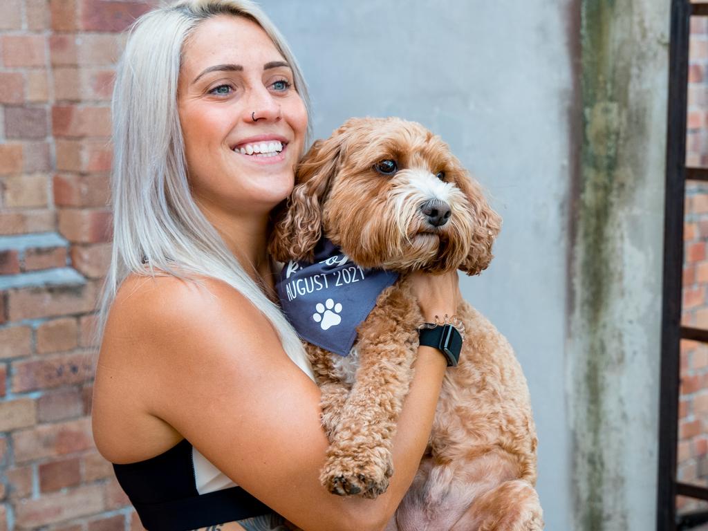 Katrina Gorry with her dog Rio. Picture: - Ann Odong/Football Australia.