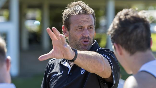 Southport assistant coach Matt Primus chats to the players during the Sharks Round 1 NEAFL win over Redland. Picture credit: TJ Yelds, NEAFL.