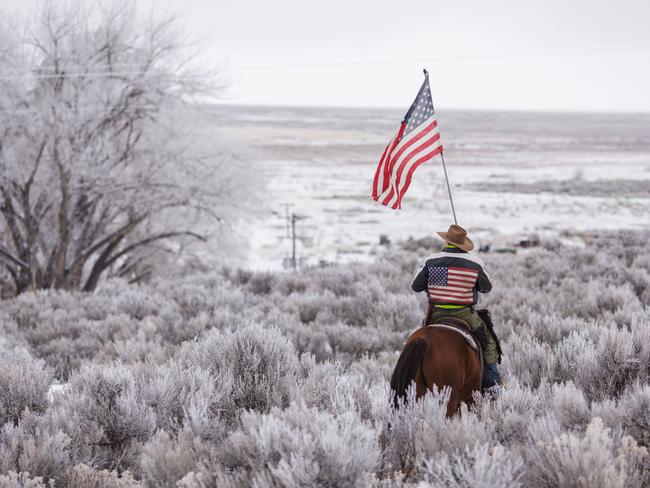 Duane Ehmer rides his horse Hellboy at the occupied Malheur National Wildlife Refuge on the sixth day of the occupation of the federal building in Burns, Oregon on January 7, 2016. The leader of a small group of armed activists who have occupied a remote wildlife refuge in Oregon hinted on Wednesday that the standoff may be nearing its end. Picture: AFP PHOTO / ROB KERR