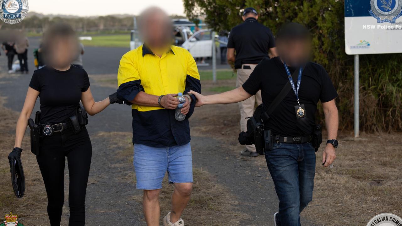 During searches on properties in NSW and Queensland, police allegedly seized electronic devices, firearm parts, drug paraphernalia and documentation referencing aircraft parts and travel to PNG.