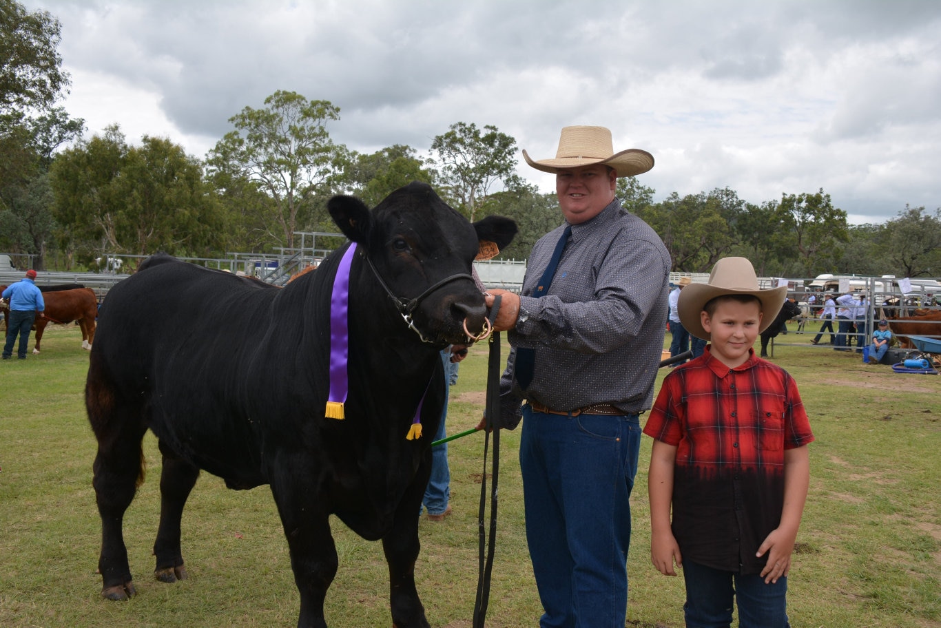 Brent Evans from Jen-Daview Limousin Stud near Kingaroy and Mitchell Duncombe with the Bos taurus junior champion bull at the 71st annual Cooyar Show. Picture: Kate McCormack