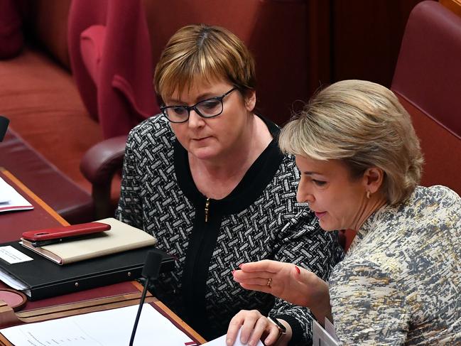 CANBERRA, AUSTRALIA - JUNE 23: Senator Linda Reynolds and Senator Michaelia Cash (right) during Senate Business at Parliament House on June 23, 2021 in Canberra, Australia. Barnaby Joyce has deposed former Nationals leader Michael McCormack during a spill called on Monday by Senator Matt Canavan, with Joyce re-elected as leader of The Nationals in a leadership contest with at least 12 votes in the 21-member partyroom. (Photo by Sam Mooy/Getty Images)