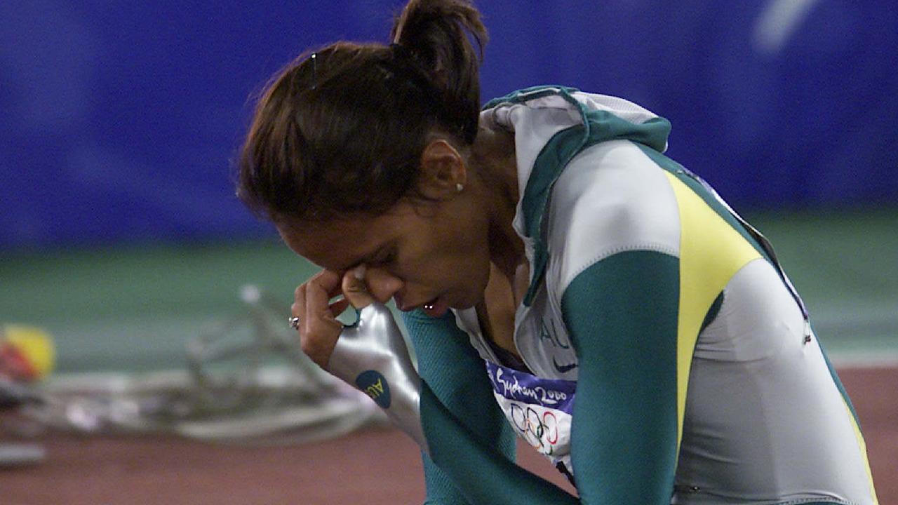 An emotional Cathy Freeman after winning the 400m final. Picture: Colleen Petch