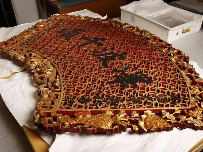 A reconstructed gold plaque with lattice from the Guan Di Temple, on loan from the Queen Victoria Museum and Art Gallery for the TMAG exhibition. Picture: Nikki Davis-Jones