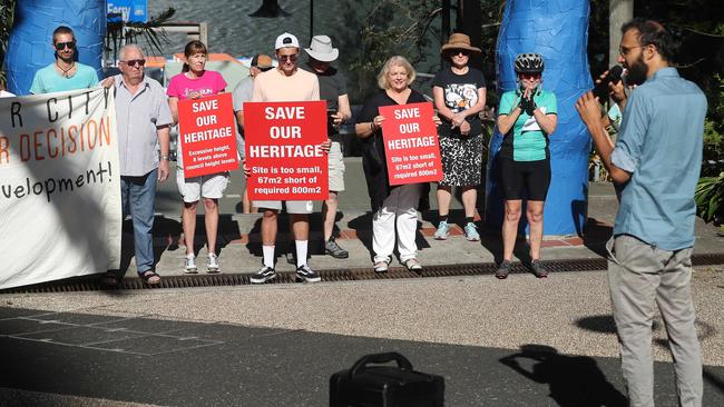 Greens councillor Jonathan Sri leads Kangaroo Point residents protesting against the destruction of heritage buildings and increased density in the area. Photographer: Liam Kidston