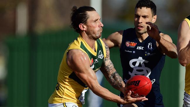 18/08/18 - SANFL: Eagles v South Adelaide at Woodville Oval.  Eagles' James Boyd fires out a handpass.Picture: Tom Huntley