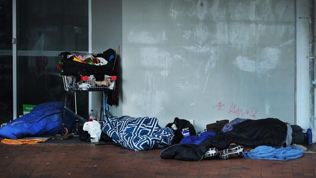 Homeless asleep in the cold empty streets of Southport in the early hours of the morning. Picture Glenn Hampson