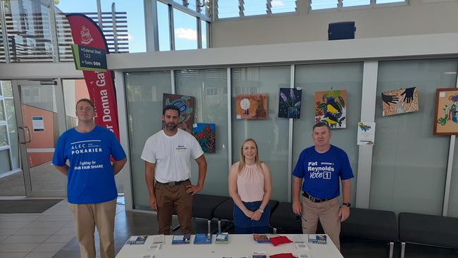 Division 1 candidates Alec Pokarier, Mark Hammel, Renee Clarke and Pat Reynolds standing 1.5m apart in solidarity. Photo: Paul Weston