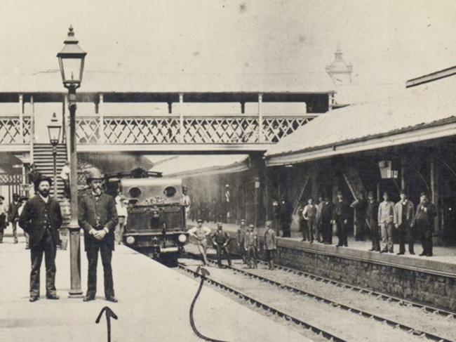 Men standing on Flinders Street Station’s centre platform in 1888. Picture: State Library Victoria.