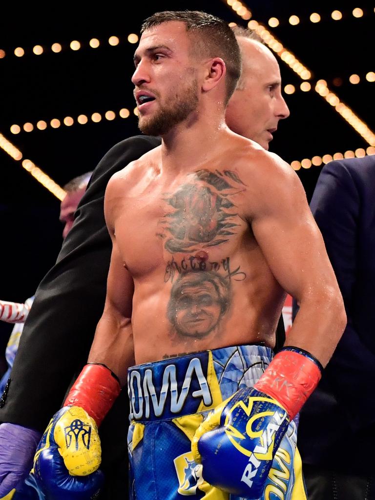 The boxer is is swapping his gloves for guns. Steven Ryan/Getty Images/AFP