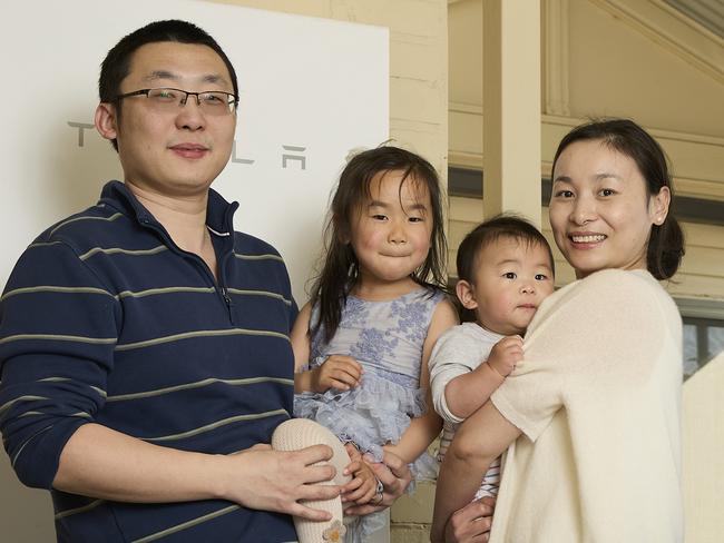 Lingwen Kong with his family, Olivia Kong, 3, Oscar Kong, 8 months, and Joy Kong at home in Fullarton, with their BYD Atto 3, solar and battery, Sunday, Sept. 10, 2023. Picture: Matt Loxton