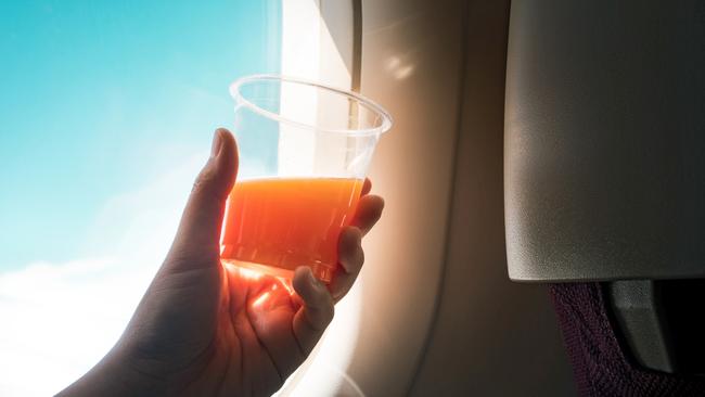 OzHarvest has been critical of airline food waste. Single-use plastic cups are also bad for the environment. Picture: Istock