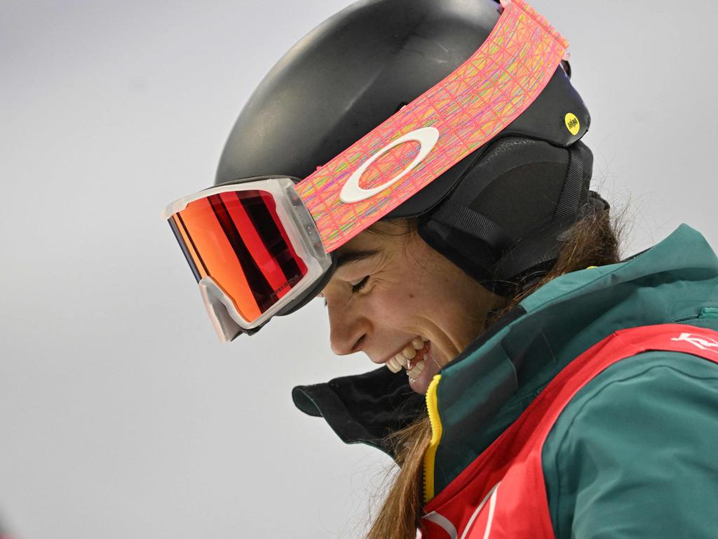 Gold medallist Australia's Jakara Anthony celebrates on the podium during the venue ceremony after the freestyle skiing women's moguls final. Picture: AFP