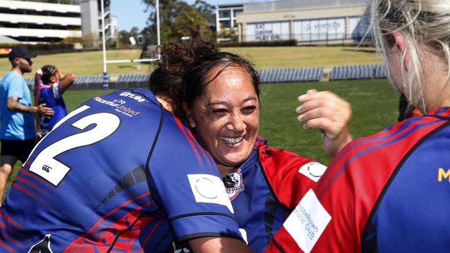 Collies captain-coach Aggie Dean is embraced by Belinda Vakarewa . Picture: John Appleyard