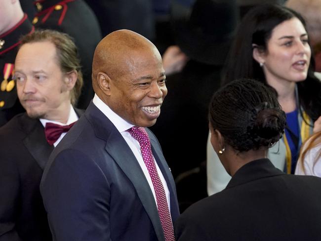 (FILES) Eric Adams (C), mayor of New York, attends the inauguration ceremony where Donald Trump will sworn in as the 47th US President in the US Capitol Rotunda in Washington, DC, on January 20, 2025. The US Justice Department on February 10, 2025 ordered federal prosecutors to drop corruption charges against Democratic New York Mayor Eric Adams, US media reported. "You are directed, as authorized by the Attorney General, to dismiss the pending charges in United States v. Adams," said the department memo obtained by the New York Times and CNN. (Photo by ALEXANDER DRAGO / POOL / AFP)