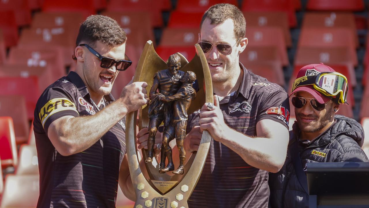 Nathan Cleary, Isaah Yeo and Api Koroisau celebrated Penrith's premiership. (Photo by Jenny Evans/Getty Images)