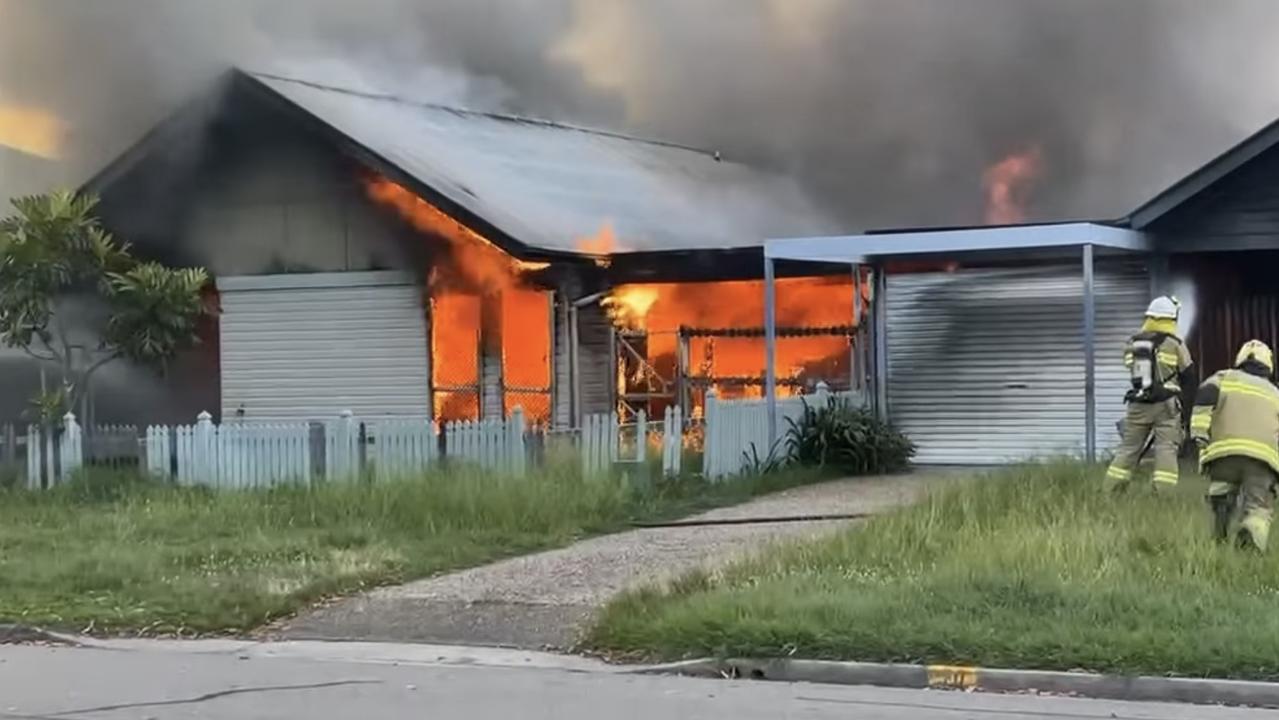 Fireys battle blaze as two dwellings go up in flames