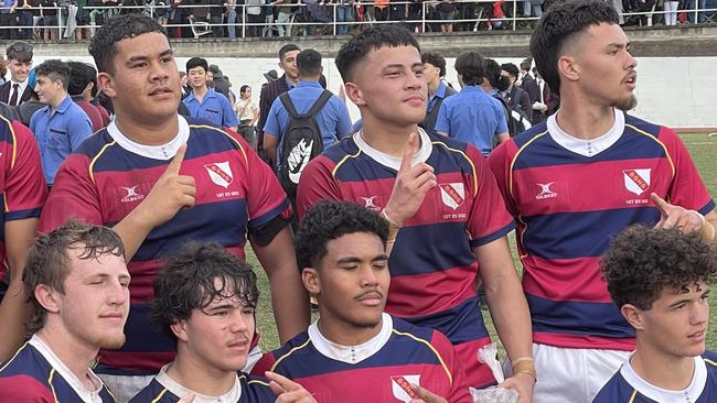 Brisbane State High School sudents and players celebrate the win.