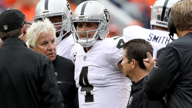Quarterback Derek Carr #4 of the Oakland Raiders leaves the game with an injury.