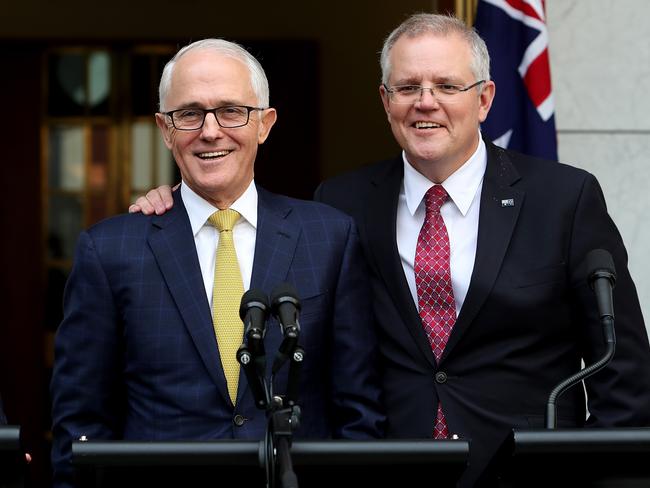 Scott Morrison embarrassingly put his arms around Malcolm Turnbull and declared: “he’s my leader”. Picture: Kym Smith