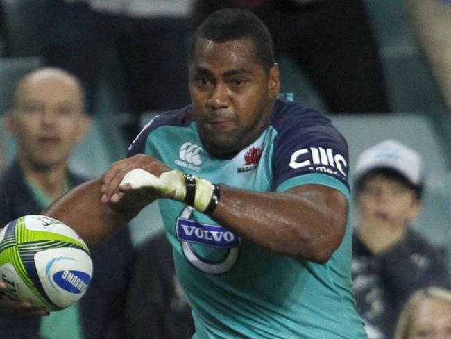NSW Waratahs Taqele Naiyaravoro powers through The Stormers players to scores a try during their Super Rugby match at the Allianz Stadium in Sydney. Picture David Moir April 11, 2015