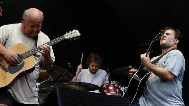 Tenacious D do their best to out-rock Dave Grohl’s Foo Fighters on acoustic guitars during their 2011 set at Metricon Stadium. Picture: Jerad Williams.