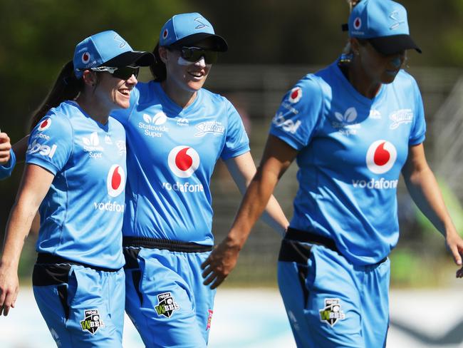 Bowlers day out: Adelaide Strikers bowlers, including Sarah Coyte, left, Megan Schutt, middle, and Sophie Devine, right, had reason to smile, restricting Sydney Thunder to 4/112. Picture: Getty Images