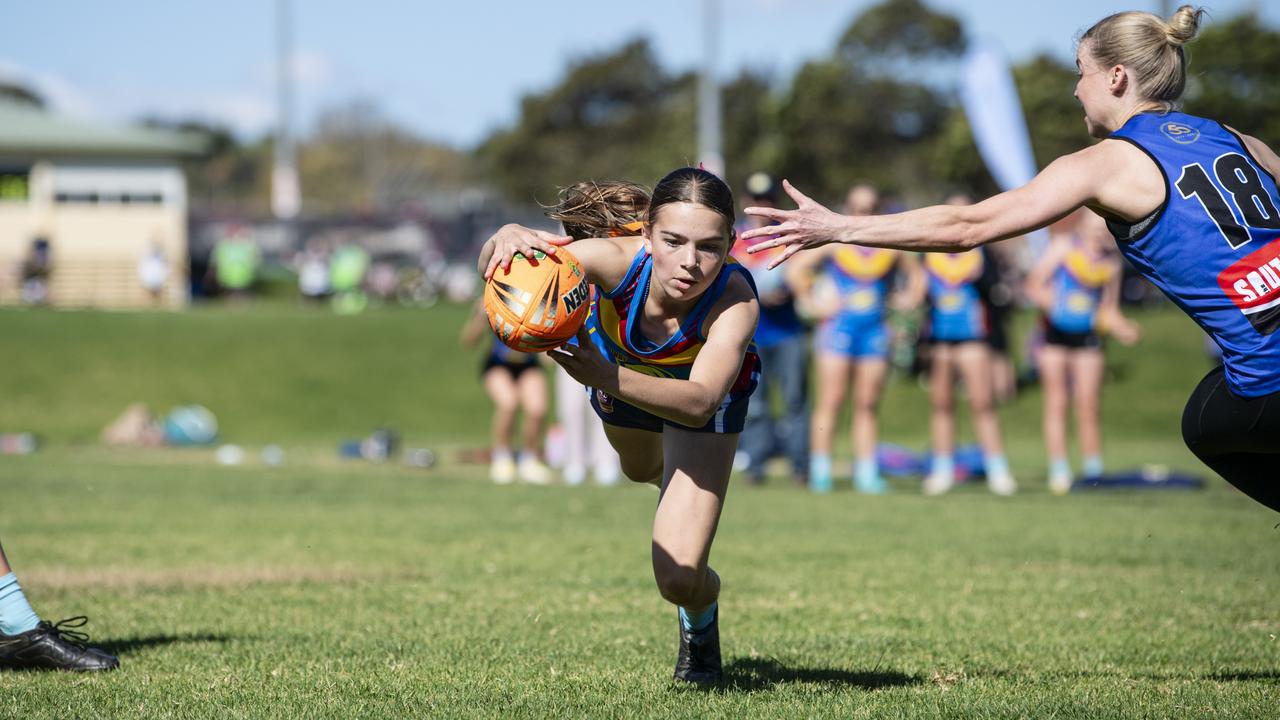 Highfields Piper York dives over for a try against Saints in the Toowoomba Touch Association C-grade women’s grand final. Pictures: Kevin Farmer