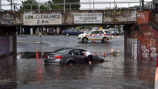 The family abandoned the car after flash flooding hit. Picture: Nicki Connolly