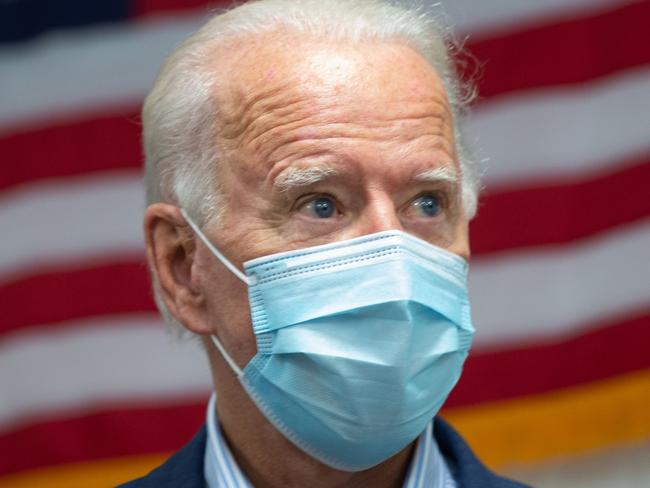 Democratic presidential nominee and former Vice President Joe Biden tours a plumbers union training center in Erie, Pennsylvania on October 10, 2020. (Photo by ROBERTO SCHMIDT / AFP)