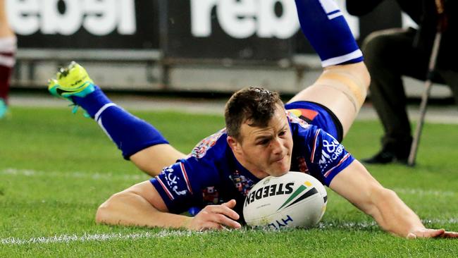 Brett Morris of the Bulldogs scores a try during the Canterbury Bulldogs v Manly Sea Eagles round 23 NRL game at ANZ Stadium. pic Mark Evans