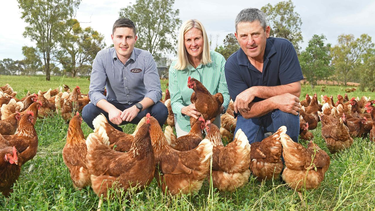 John Rohde (R) with wife Ange (C) and son Martin (L) on their Tarlee free range egg farm. Picture: Tom Huntley.