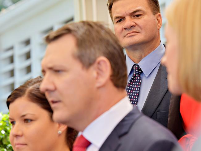 Right behind you, boss ... Agriculture Minister Ken Vowles looks down upon Chief Minister Michael Gunner and Attorney-General Natasha Fyles